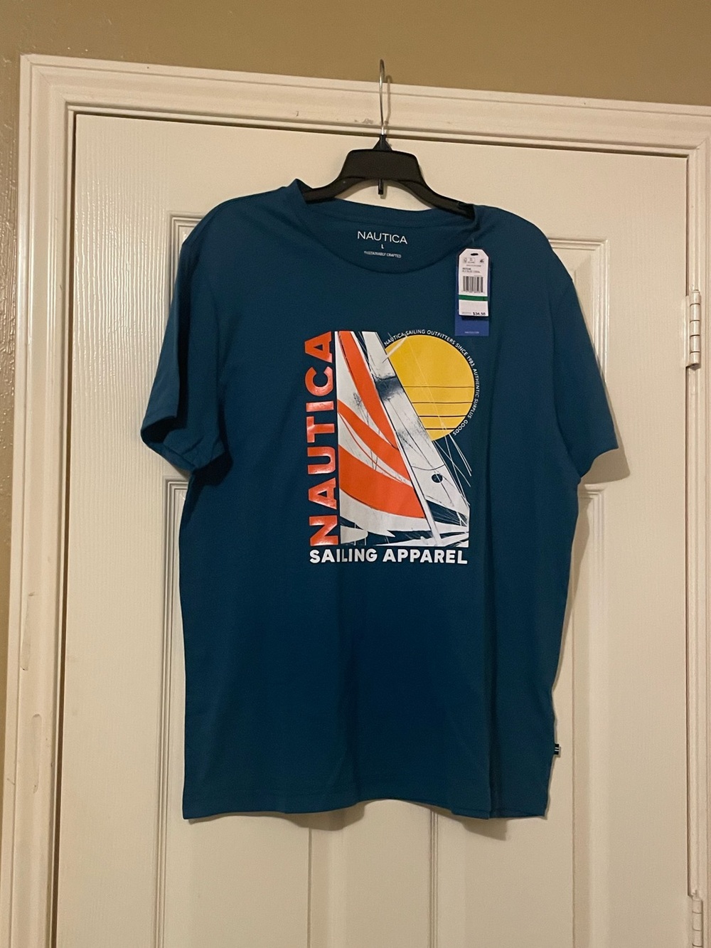 Nautica Men's Teal Graphic Sailing Tee with Orange & Yellow Accents